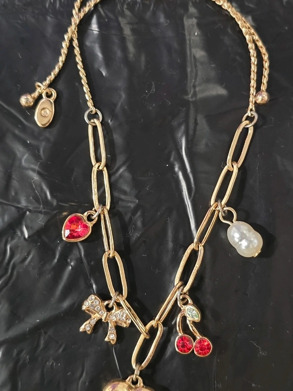 Gold-Tone Charm Necklace with Red Crystal & Pearl Charms